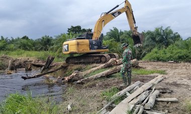 Sasaran Fisik TMMD Ke-129 Kodim 0313/KPR, Di Kebut Gunakan Alat Berat Untuk Peningkatan Badan Jalan 2.5 KM x 5 Meter
